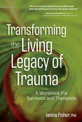 A book cover with the title of transforming the living legacy of trauma.