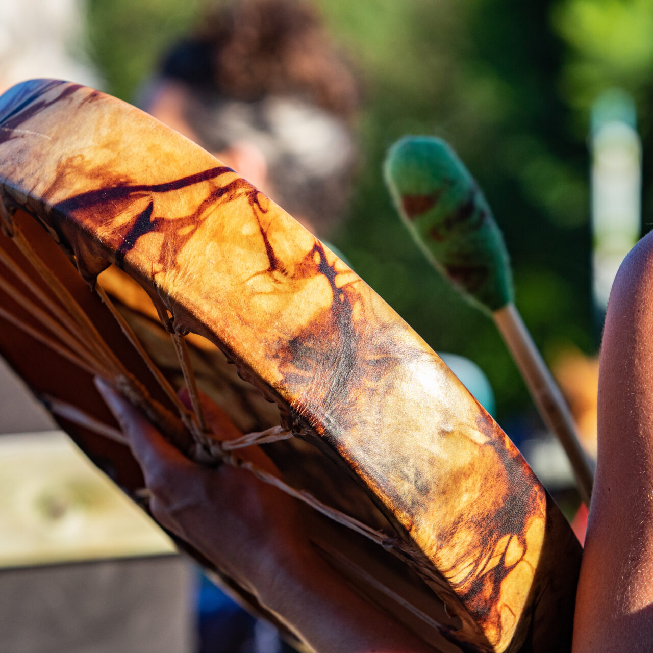 A person holding an object in their hand.